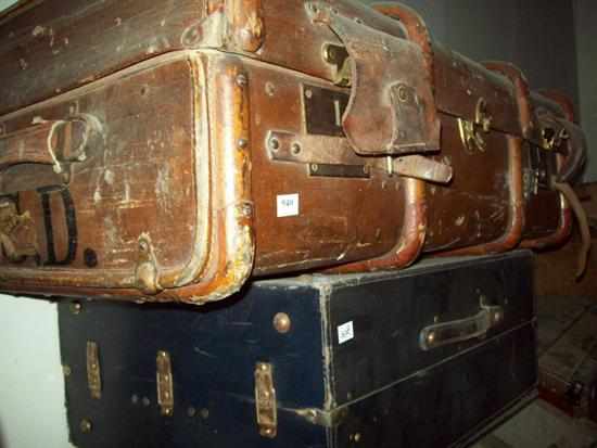 Appraisal: A METAL BOUND TRAVELLING CASE AND ONE 'S CASE