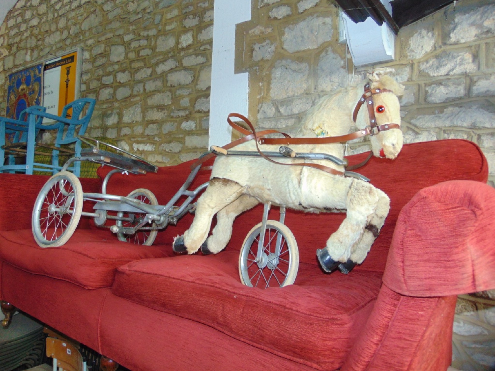 Appraisal: A vintage tubular steel framed child's tricycle in the form