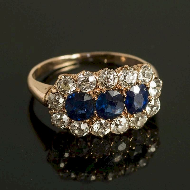 Appraisal: K Sapphire and Diamond Ring Sapphire and diamond k ring