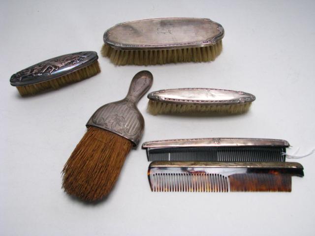 Appraisal: Sterling Silver Handled Brushes Combs including sterling handled whisk broom