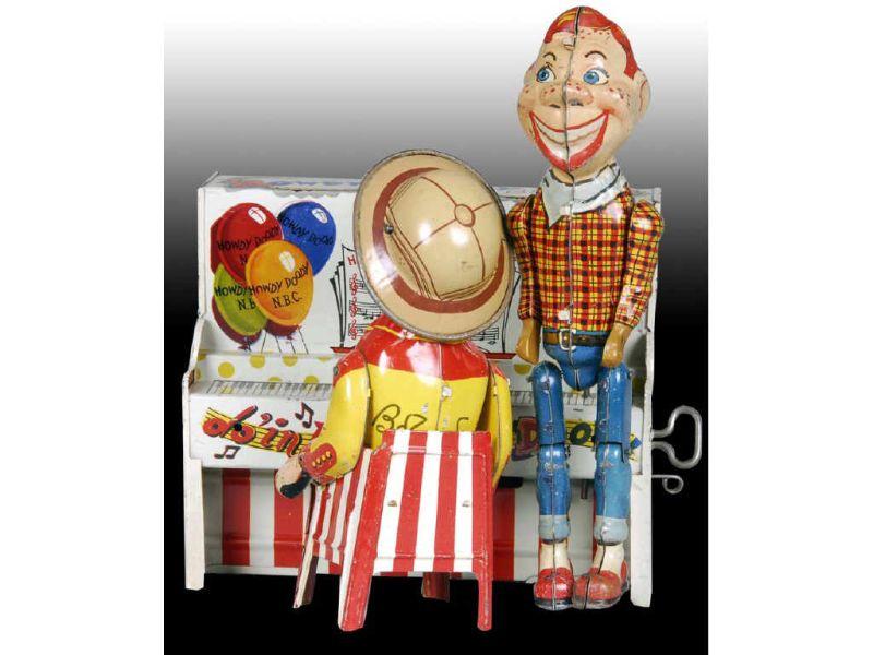 Appraisal: Tin Wind-Up Unique Art Howdy Doody Toy Band Description -