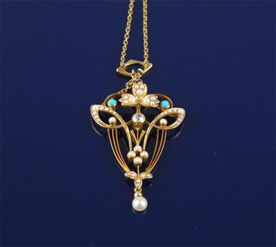 Appraisal: An Art Nouveau gold pendant set with a diamond seed