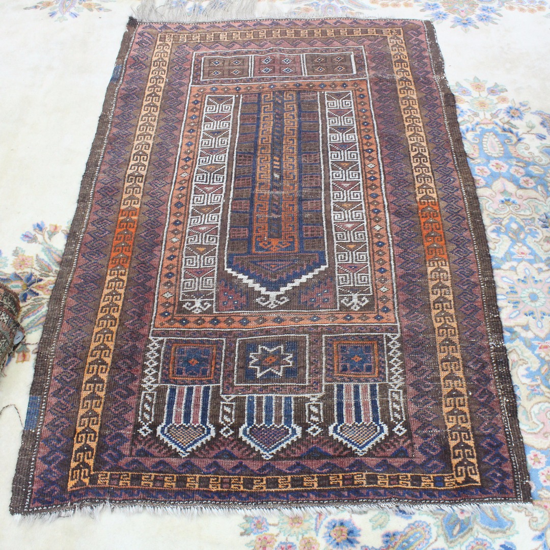 Appraisal: Two Beluchi rugs the largest x cm and a Caucasian