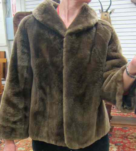 Appraisal: LADY'S MOUTON LAMB FUR JACKET brown fur with collar and