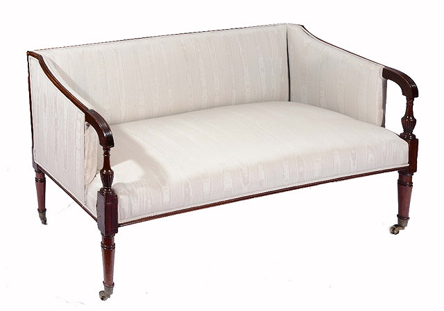 Appraisal: A GEORGIAN MAHOGANY FRAME UPRIGHT SETTEE on four ring turned