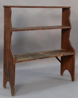 Appraisal: Pine bucket bench having three shelves on boot jack ends