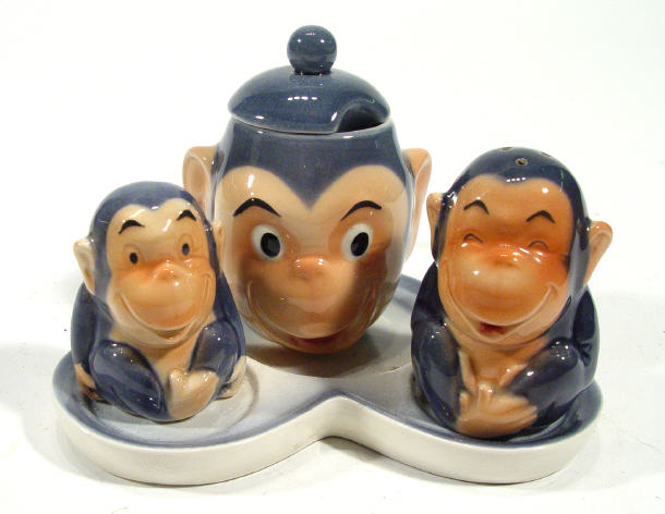 Appraisal: Hand painted Goebels monkey design cruet set on stand factory