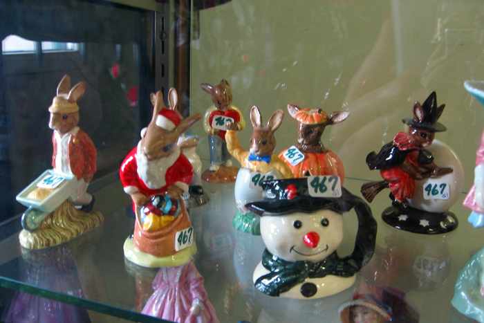 Appraisal: A COLLECTOR'S GROUP OF ROYAL DOULTON FIGURES AND A SNOWMAN