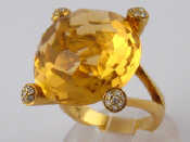 Appraisal: A yellow metal tests carat gold citrine and diamond ring