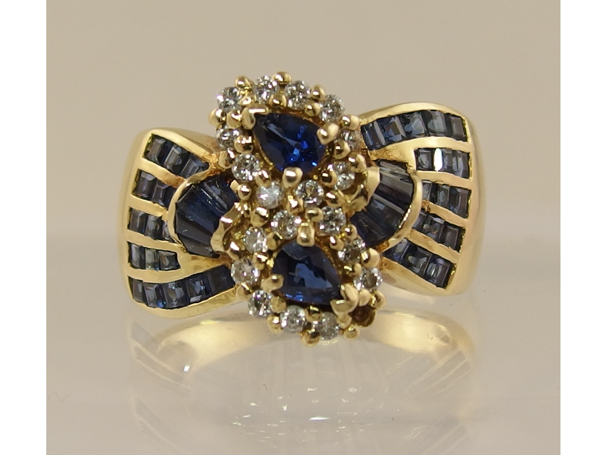 Appraisal: An ct blue gem stone and diamond dress ringthe wide