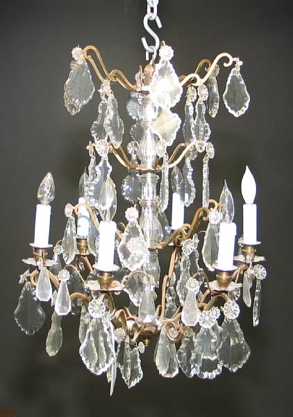 Appraisal: A patinated metal and glass six light chandelier mid th