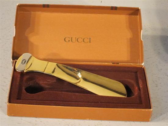 Appraisal: Gucci gold plated shoe horn in original box