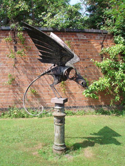 Appraisal: WALENTY PYTEL A large sculpture of Winged Bird with scrolling