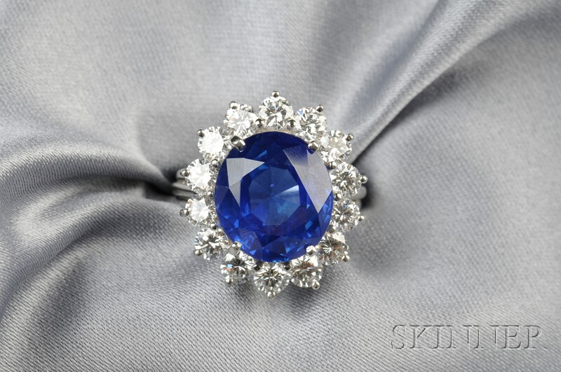 Appraisal: Platinum Sapphire and Diamond Ring set with an oval-cut sapphire