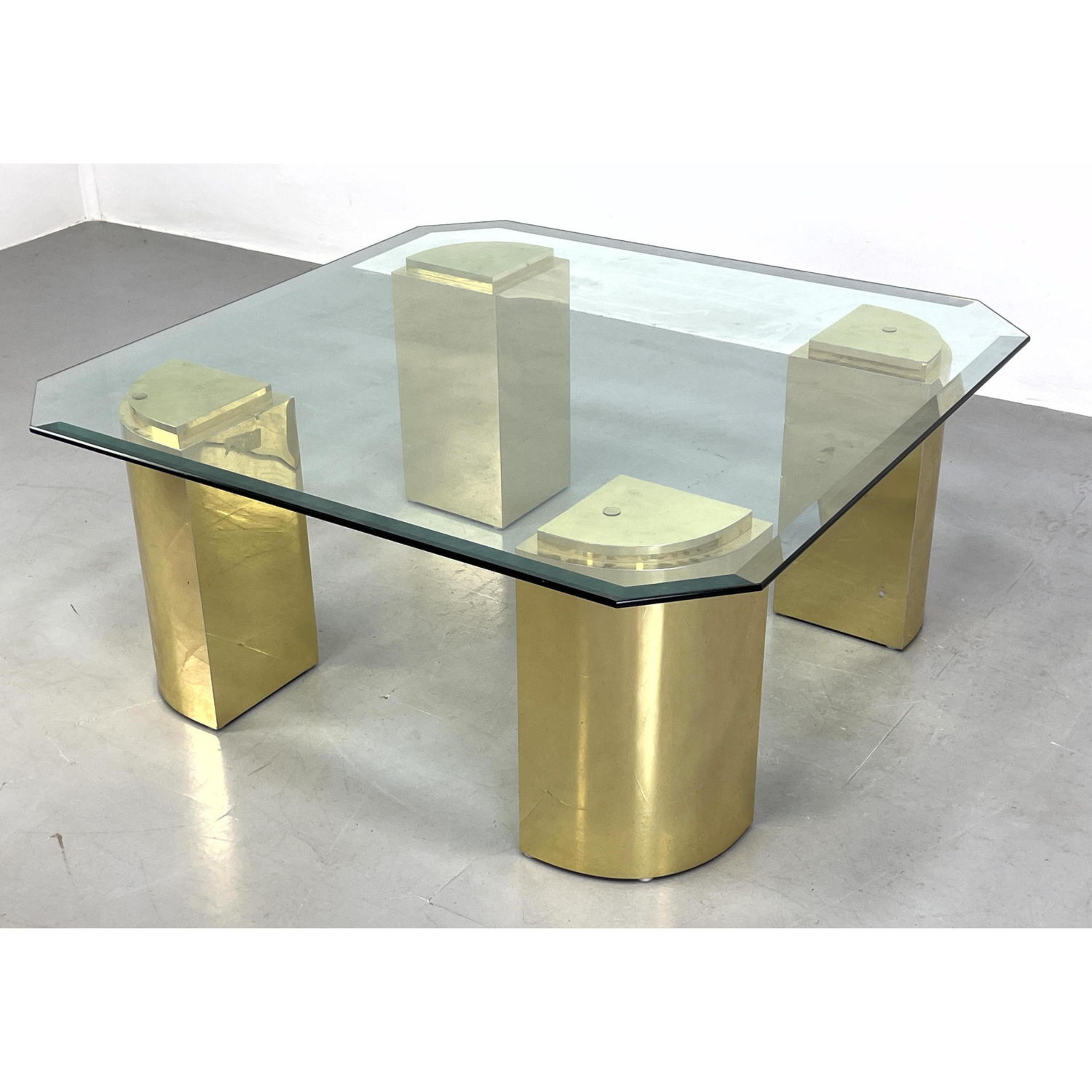 Appraisal: Springer style Coffee Table laminate on wood base beveled glass