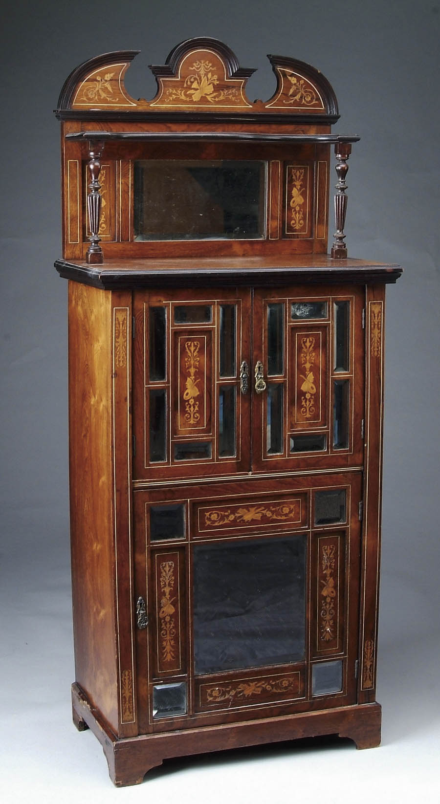 Appraisal: AESTHETIC MOVEMENT ITALIAN INFLUENCED INLAID MUSIC CABINET Music cabinet has