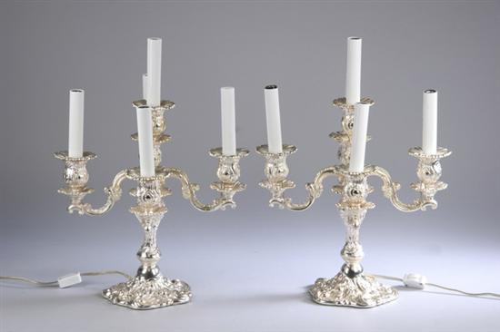 Appraisal: PAIR SILVER PLATED FIVE-LIGHT CANDELABRA th century In the Rococo