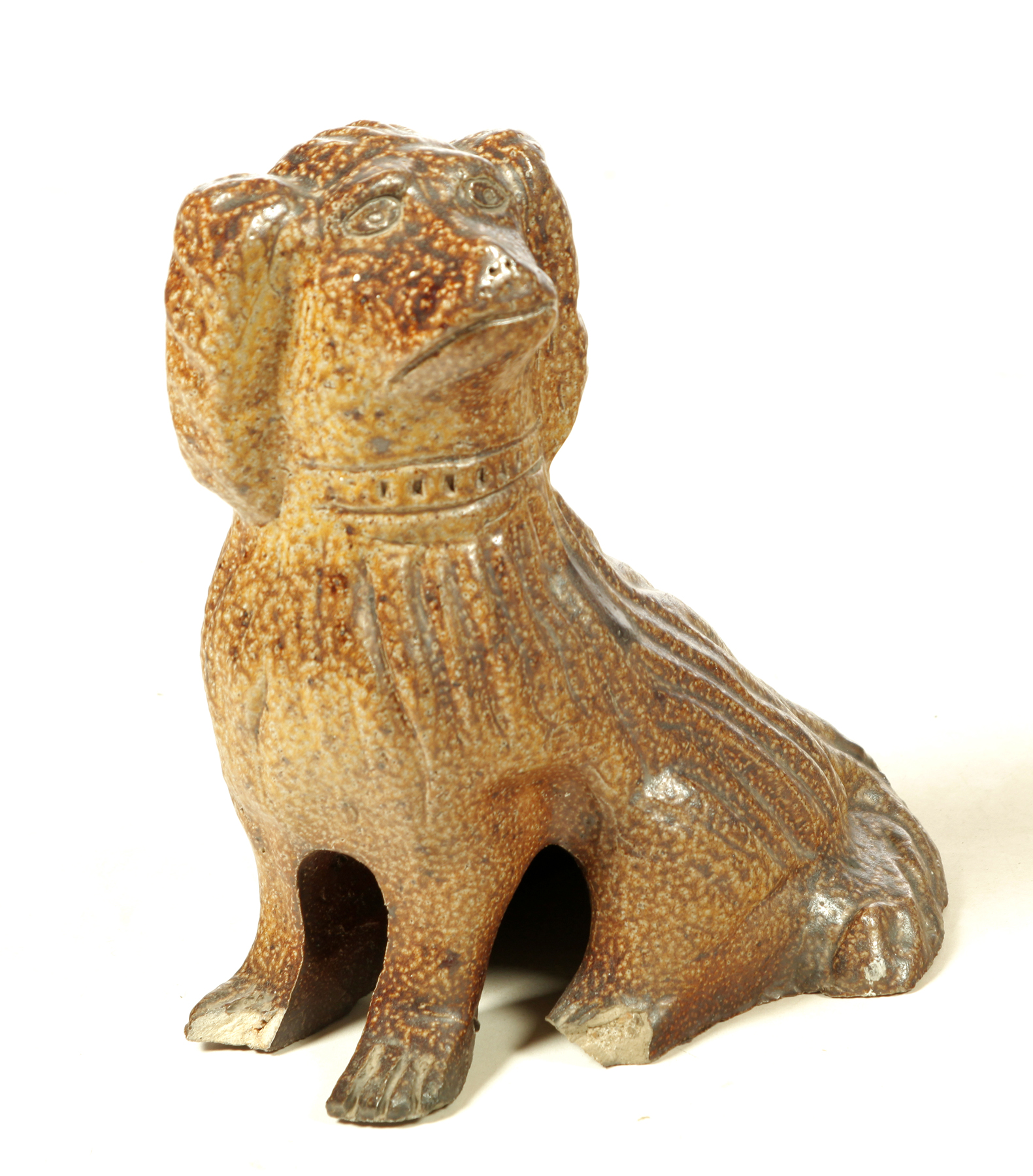 Appraisal: SEWERTILE FLAT HEAD DOG Ohio early th century Seated spaniel