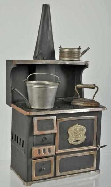 Appraisal: Children's Tin Garland Stove Description Includes all six cast iron