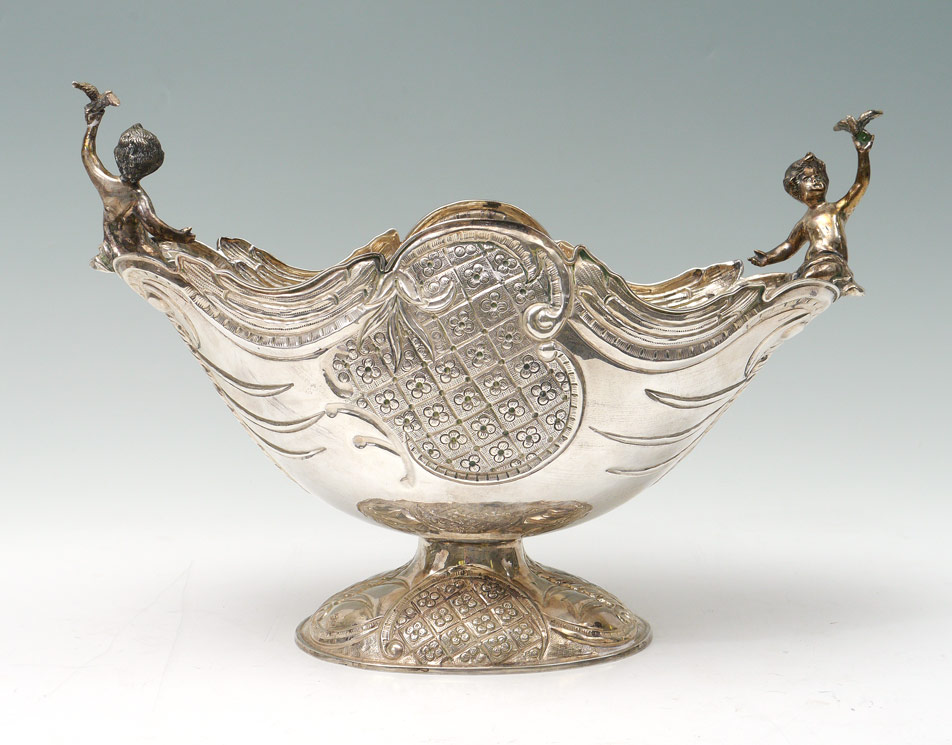 Appraisal: NISAN FIGURAL SILVER CENTERBOWL Large centerbowl with figural putti holding