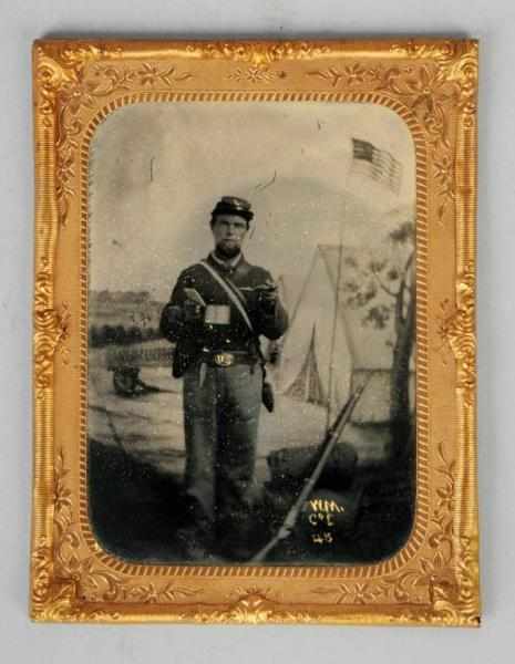 Appraisal: Civil War Soldier Tintype Description Soldier pictured with gun knife