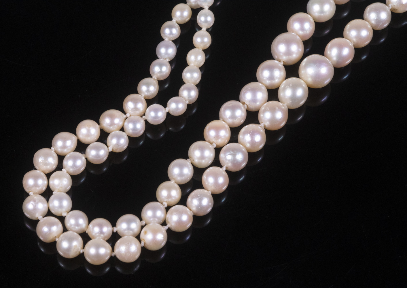 Appraisal: GRADUATED PEARL NECKLACE Double Strand of Graduated Pearls to mm