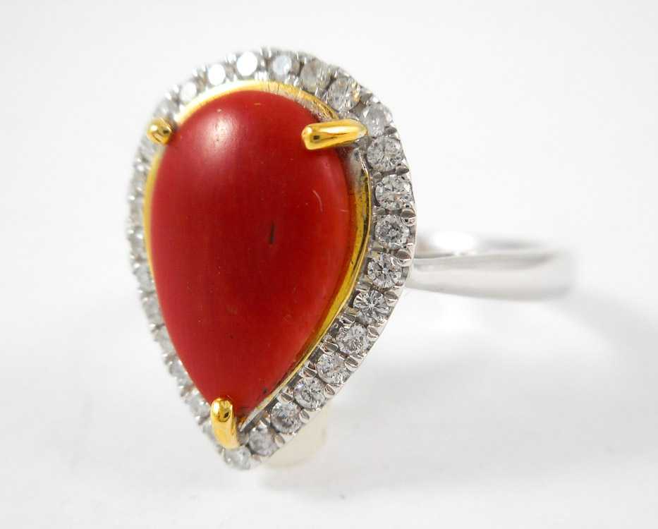 Appraisal: CORAL DIAMOND AND FOURTEEN KARAT GOLD RING The white and