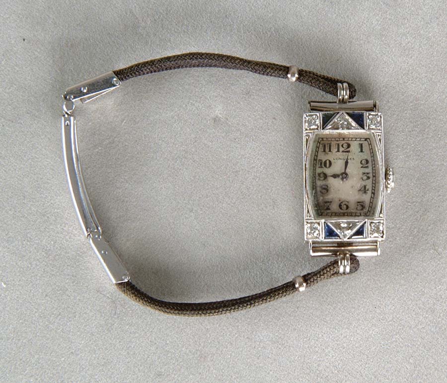 Appraisal: VINTAGE PLATINUM DIAMOND SAPPHIRE WATCH This wonderful vintage Longines wristwatch