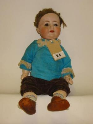 Appraisal: A Porzellenfabrik Burggrub bisque head character doll with brown sleeping