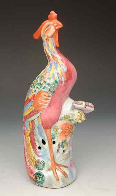 Appraisal: A CHINESE PORCELAIN FIGURE of a peacock decorated in polychrome