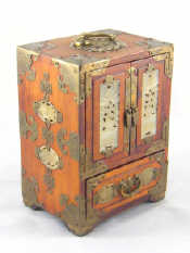 Appraisal: A Chinese brass mounted hardwood cabinet of three drawers behind