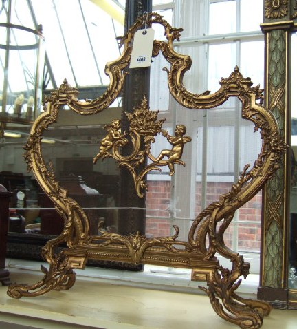 Appraisal: A Louis XV style gilt metal fire screen of lozenge