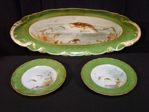 Appraisal: LIMOGES PORCELAIN FISH PLATTER AND SET OF TWELVE PLATES Circa