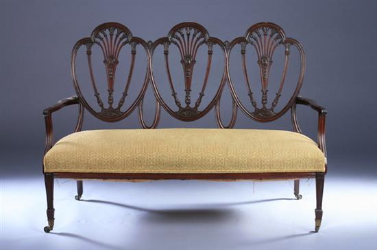 Appraisal: MAHOGANY GEORGE III STYLE TRIPLE CHAIR-BACK SETTEE th century gold