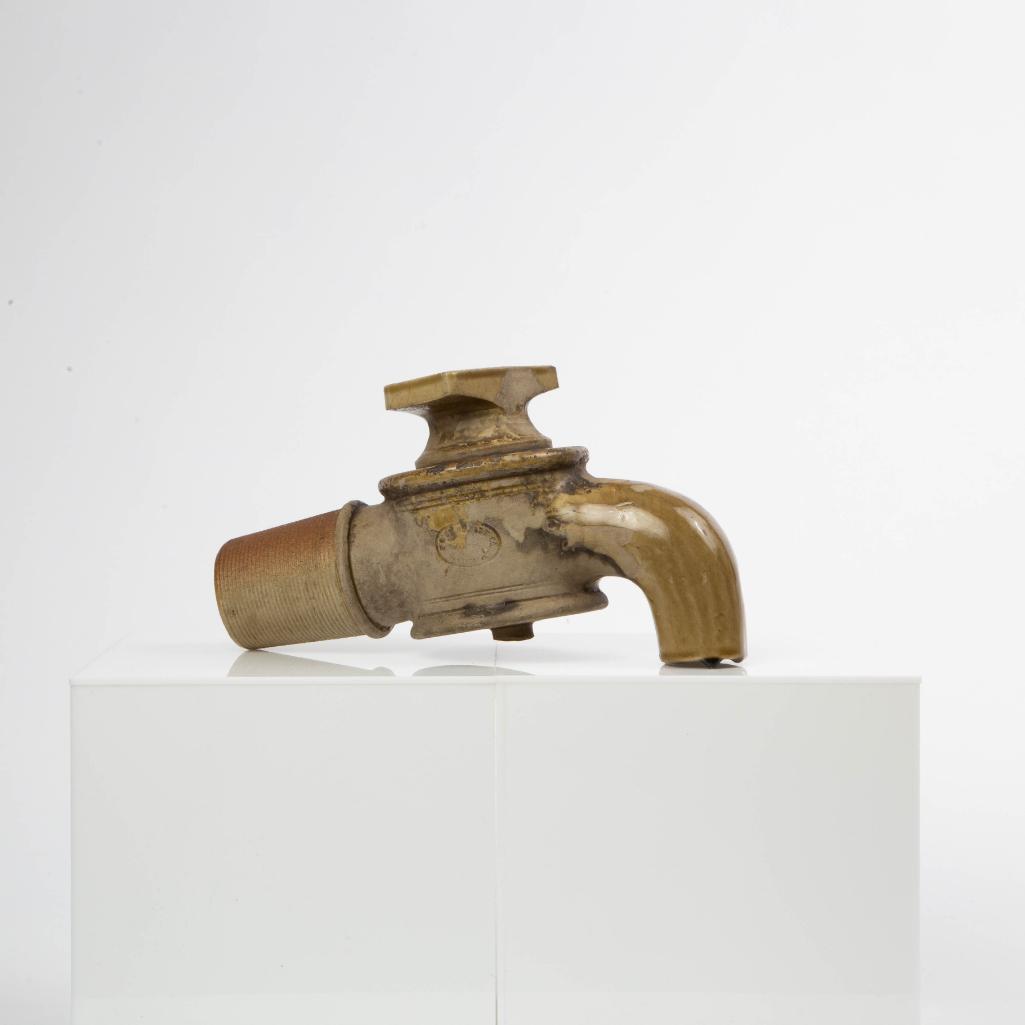 Appraisal: A U S STONEWARE CO GLAZED VALVE An oversized parcel-glazed