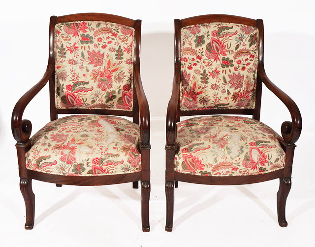 Appraisal: A PAIR OF LOUIS PHILIPPE MAHOGANY OPEN ARMCHAIRS with upholstered