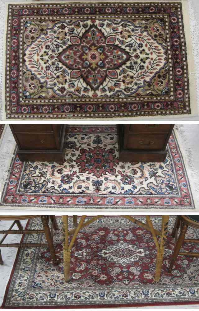 Appraisal: THREE HAND KNOTTED ORIENTAL AREA RUGS Pakistani-Persians all floral and