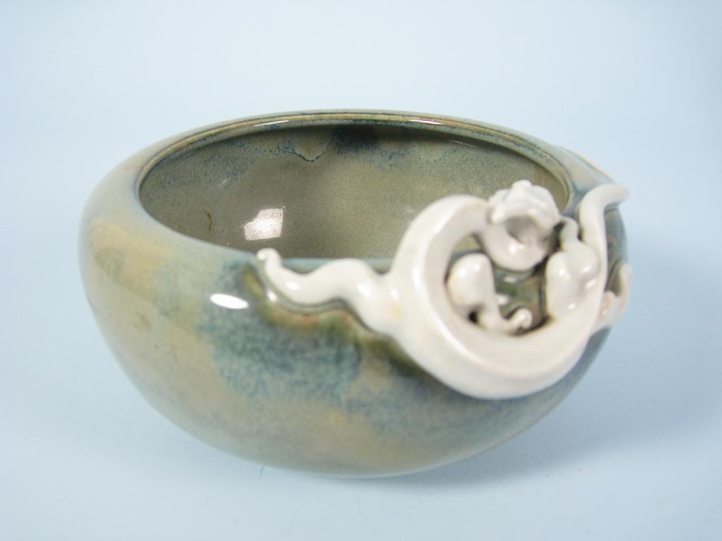 Appraisal: A Japanese Studio Bowl with moulded dragon in relief on