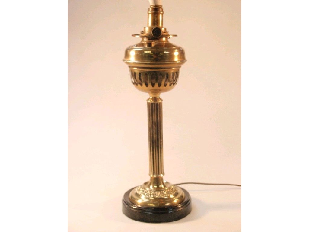 Appraisal: A Victorian brass oil lamp now converted for electricity