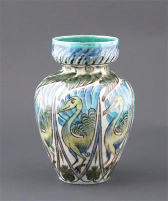 Appraisal: A William De Morgan Persian earthenware vase with knopped neck