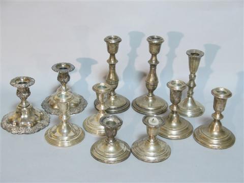 Appraisal: FOUR PAIRS OF SILVER CANDLESTICKS With weighted bases including two