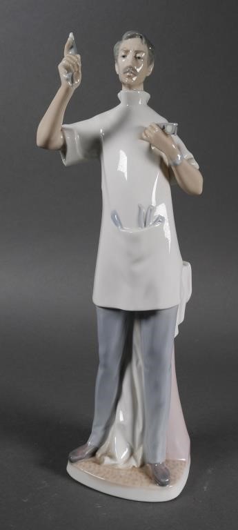 Appraisal: LLADRO FIGURINE DENTISTPorcelain Lladro of a dentist Sculpture measures approx