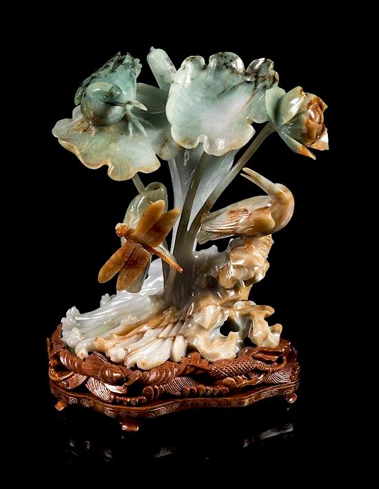 Appraisal: A Green Russet and Pale Celadon Jadeite Figural Group of