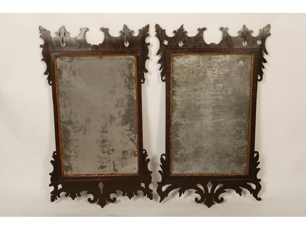 Appraisal: A NEAR PAIR OF GEORGE II MAHOGANY MIRRORS the original