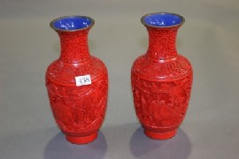 Appraisal: A pair of red lacquer vases