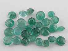 Appraisal: A quantity of loose polished round emeralds approx carats