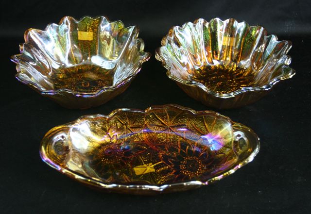 Appraisal: A collection of carnival glass comprising a pair of flower