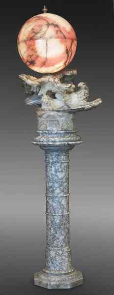 Appraisal: Carved and painted alabaster lamp on a pedestal the illuminated