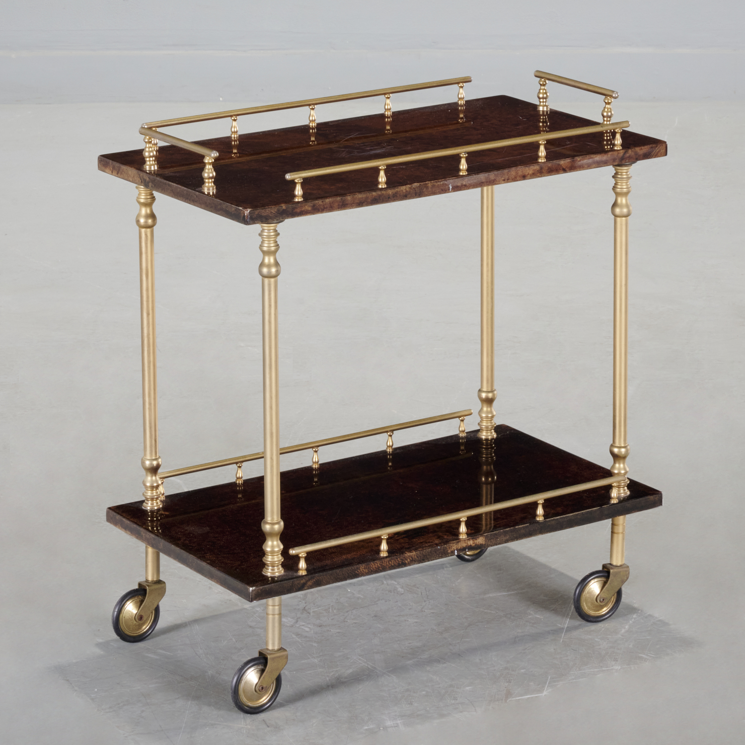 Appraisal: ALDO TURA TWO-TIER PARCHMENT CLAD DRINKS CART c s Italy