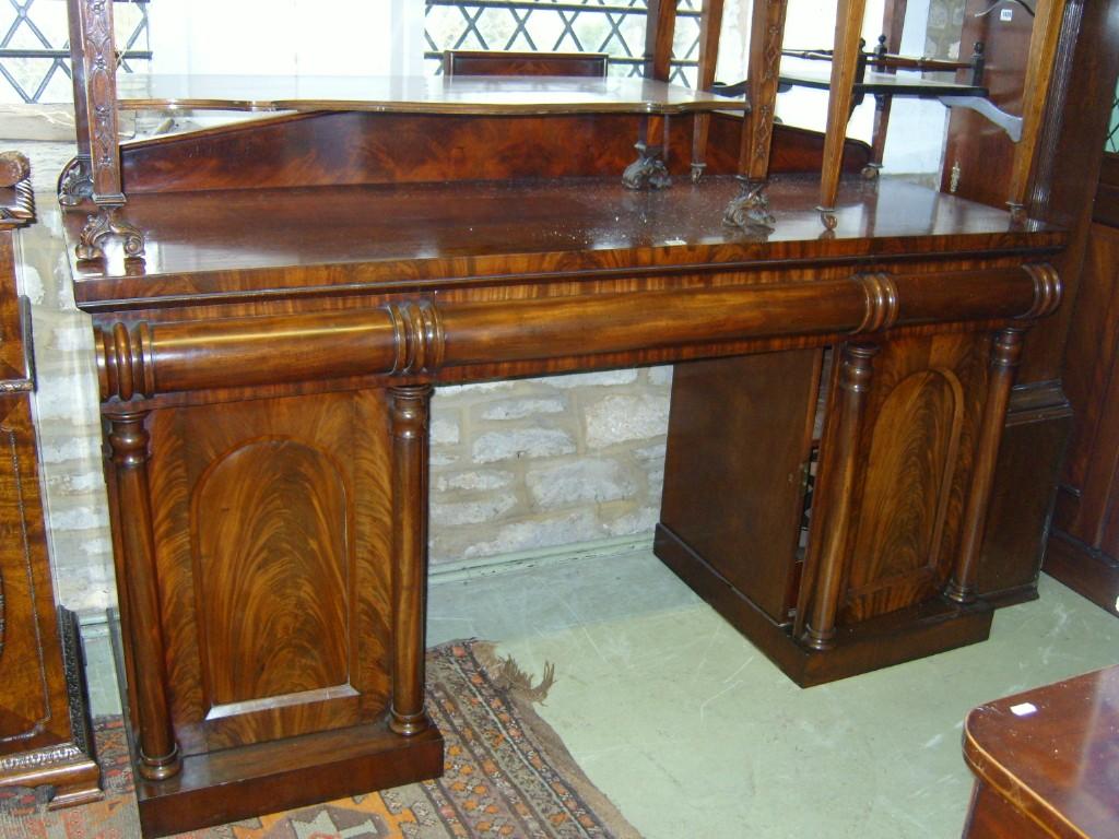 Appraisal: A mid Victorian mahogany pedestal sideboard enclosed by two arched